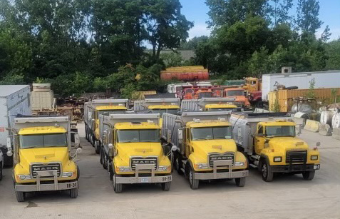 Row of Sydby Yellow Trucks